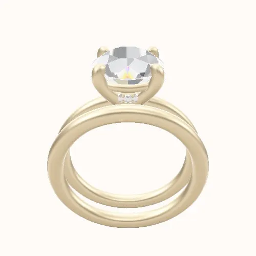 Solitaire Engagement Ring With Low Set Four Prong Head and Matching Band